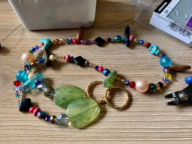 eclectic handmade beaded curtain tiebacks with skulls birds and crystals